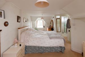 Bedroom One- click for photo gallery